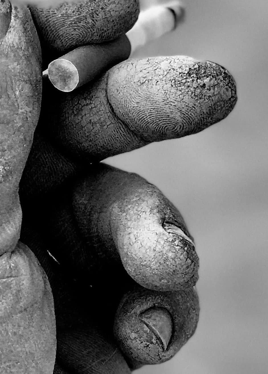 Black-and-white close-up of weathered hands