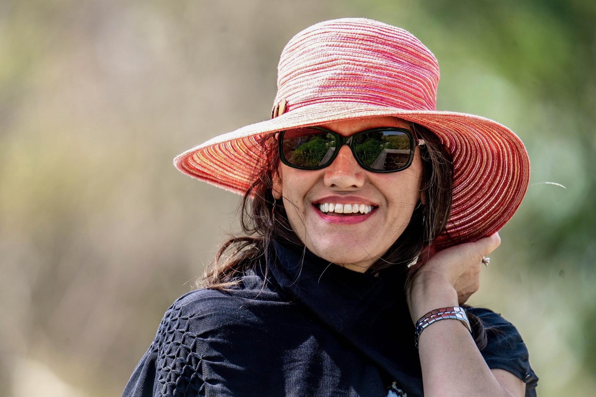 Martha Saettele in a wide-brimmed hat