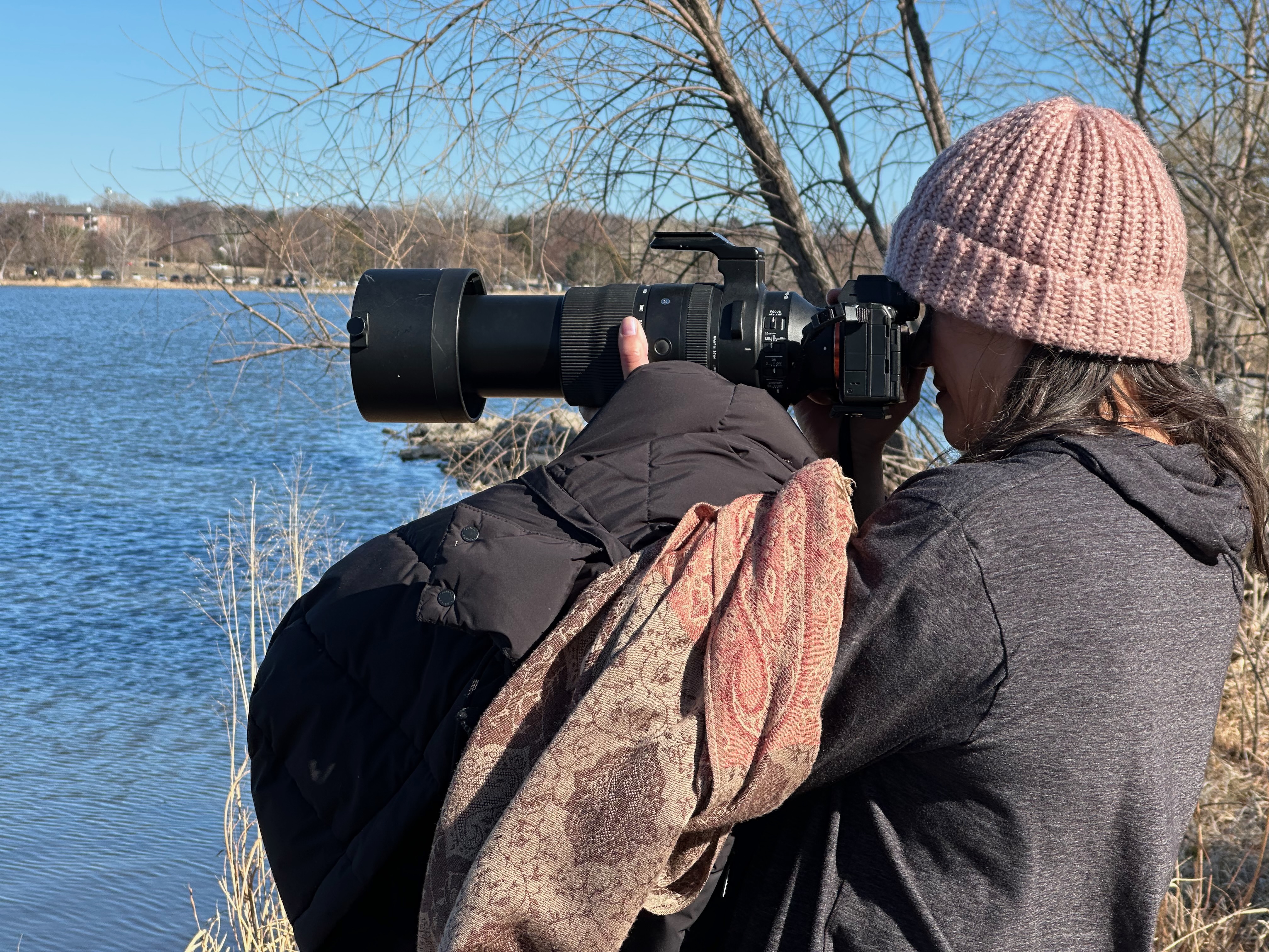 Martha photographing beside the water